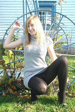 Amateur girls in pantyhose posing in public place