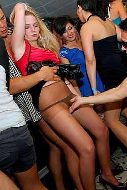 Sexy girls flashes her pantyhose on a party