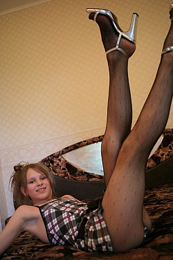 Teenage girls showing off their legs covered pantyhose on private pictures