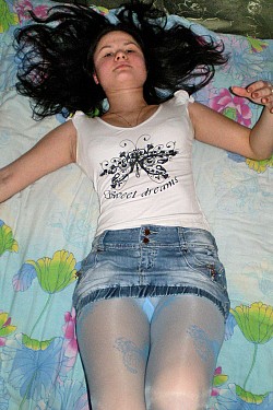 Young amateur girl in blue patterned pantyhose with no a panties
